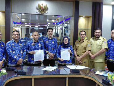 Foto: perjanjian pinjam pakai lahan seluas 141 Ha tersebut antara Pemerintah Provinsi (Pemprov) Sumatera Utara (Sumut) dengan Pemkab Deli Serdang. (Kominfostan ds)