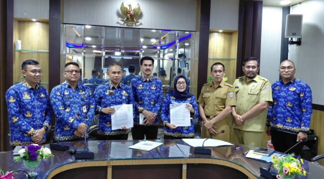 Foto: perjanjian pinjam pakai lahan seluas 141 Ha tersebut antara Pemerintah Provinsi (Pemprov) Sumatera Utara (Sumut) dengan Pemkab Deli Serdang. (Kominfostan ds)