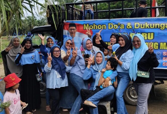 
					Ratusan Pendukung Arak Terang Lesmana Keliling Batu Lokong, Nomor 02 Disambut Gelora Kemenangan