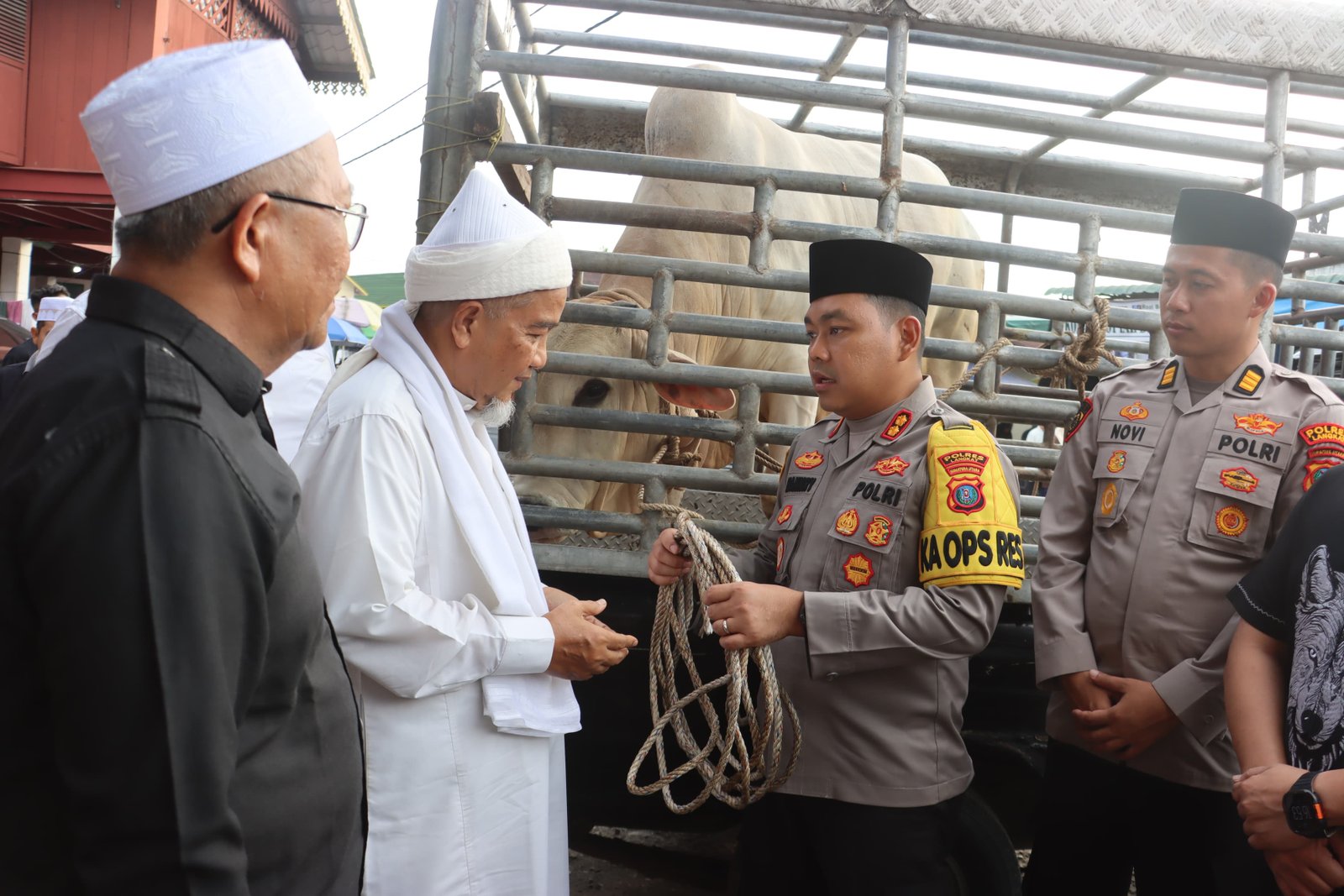 Polres Langkat Beri Bantuan Sapi untuk HUL ke-103 Tuan Guru Babussalam